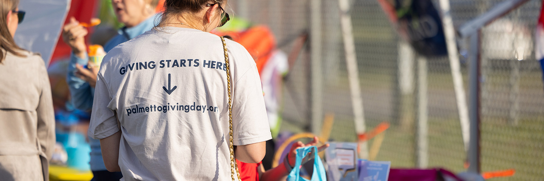 Woman with a palmetto giving day t-shirt