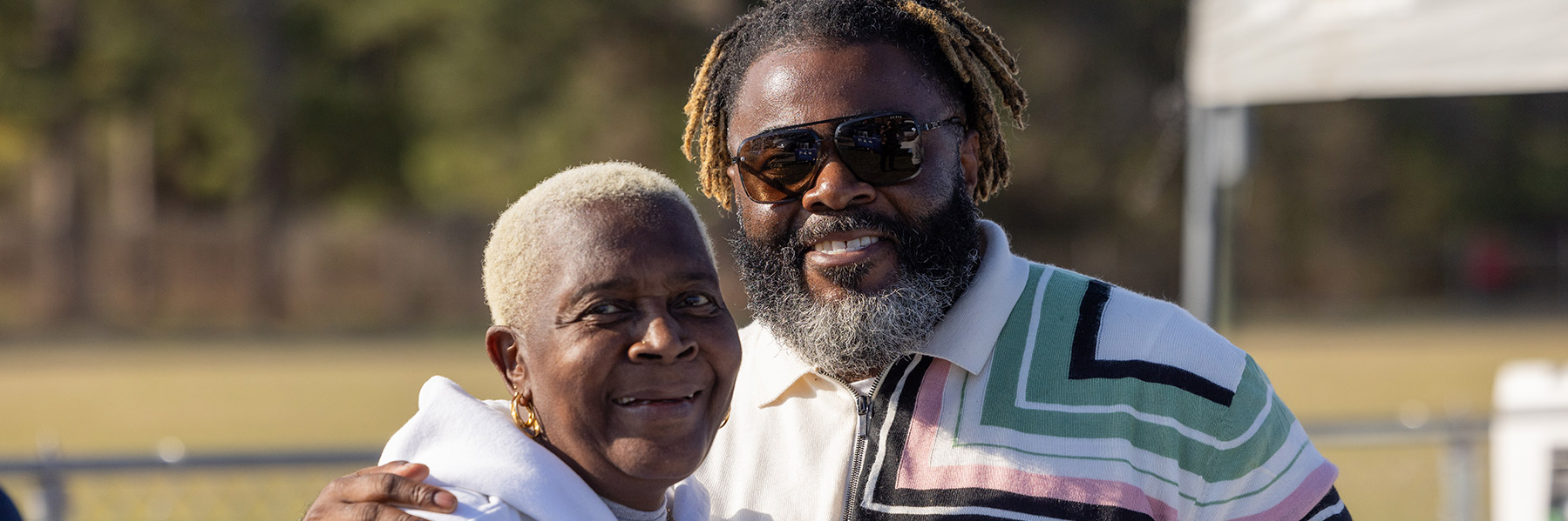 man and woman smiling